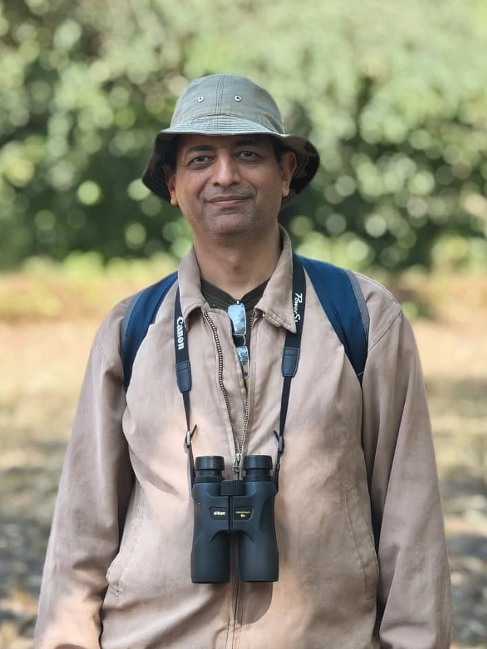 Vikram, nature guide and camp lead at Evolve Back Nisargshala, helping families reconnect with nature
